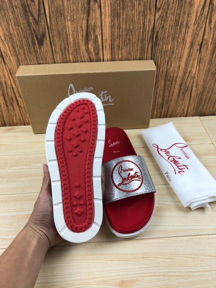 CHRISTIAN LOUBOUTIN SLIPPERS